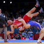 Charles Edward Betts of U.S. fights with Micronesia'a Keitani Grahamon the Men's 84Kg Greco-Roman wrestling at the ExCel venue during the London 2012 Olympic Games